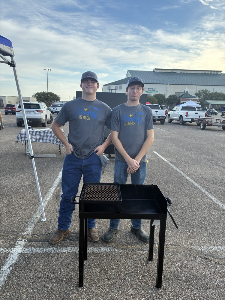 Simon and Joseph with their bbq pit 
