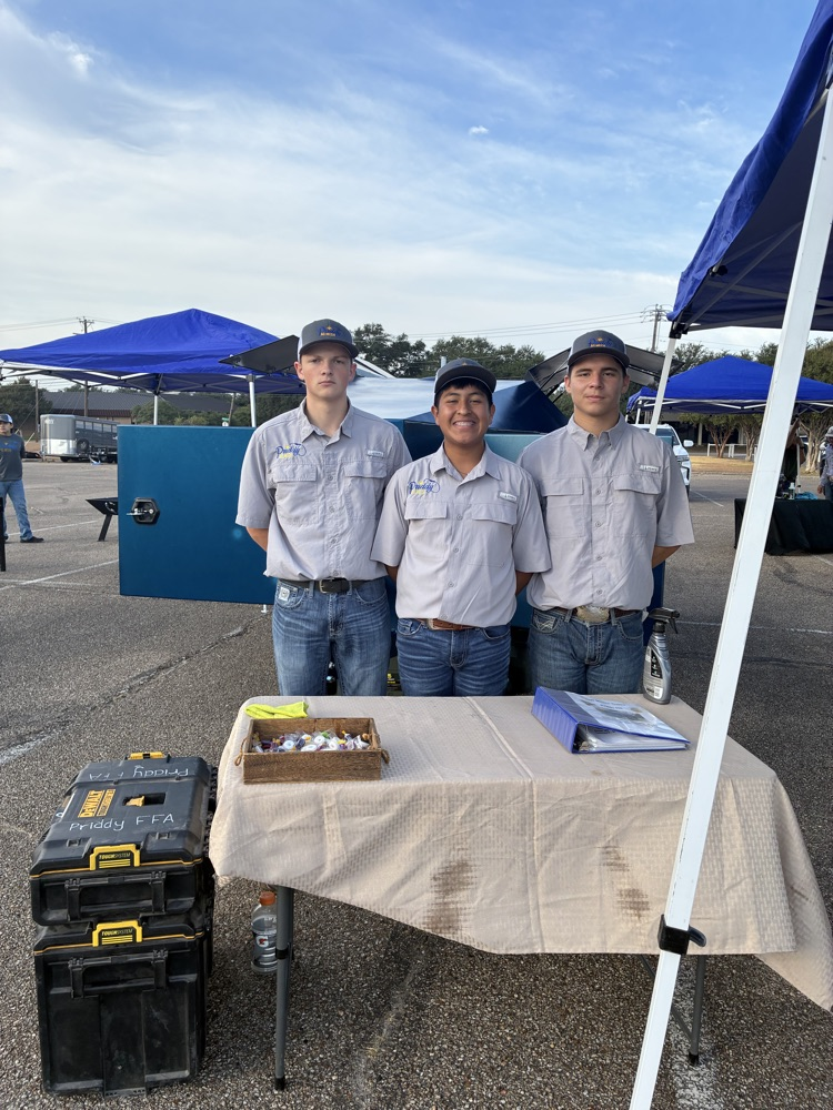 Jaxon, Diego, and Brailen with their fuel trailer