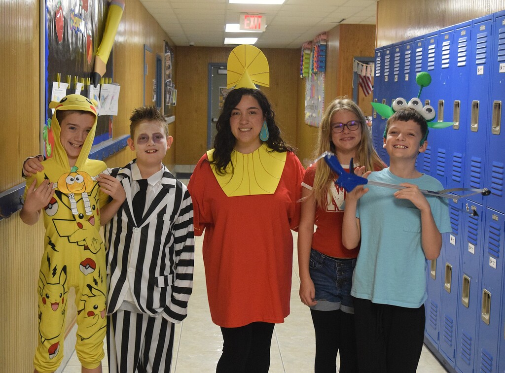 Home coming spirt weekday one. Movie day.  4 kids and 1 teacher