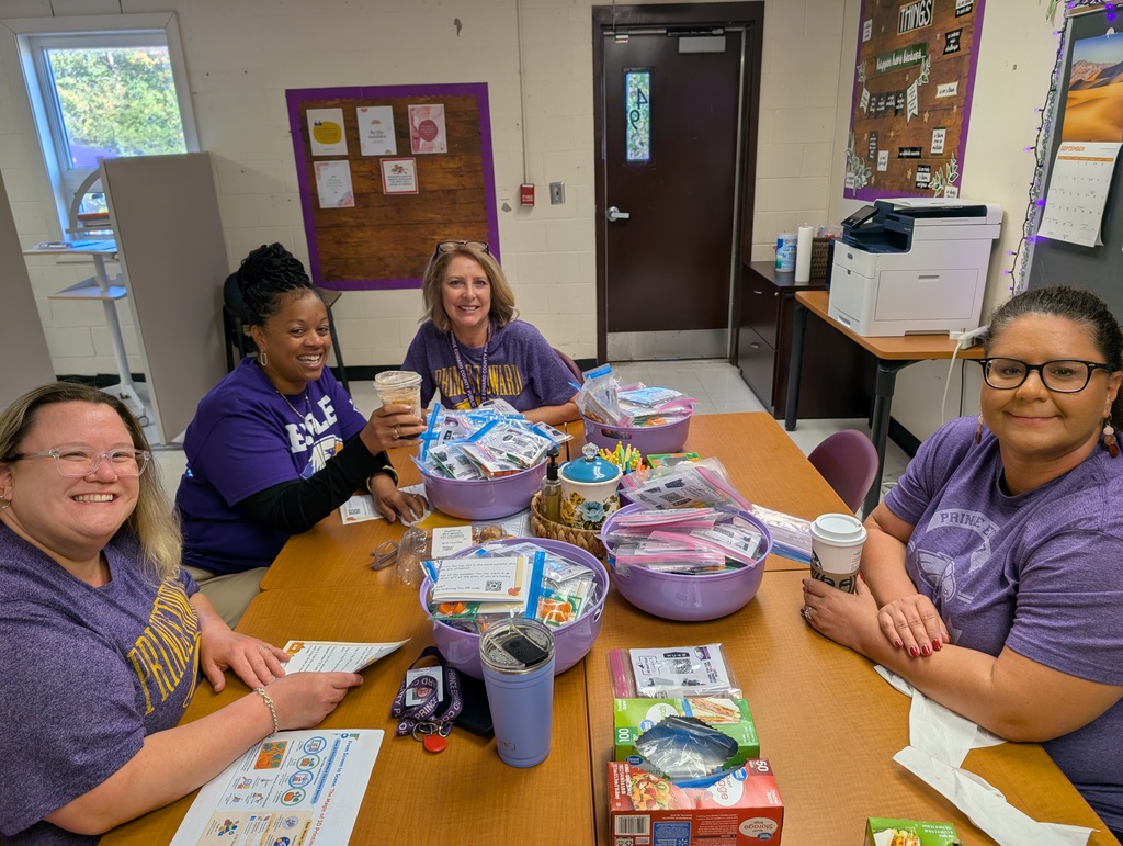 STEM Team working on event at a table