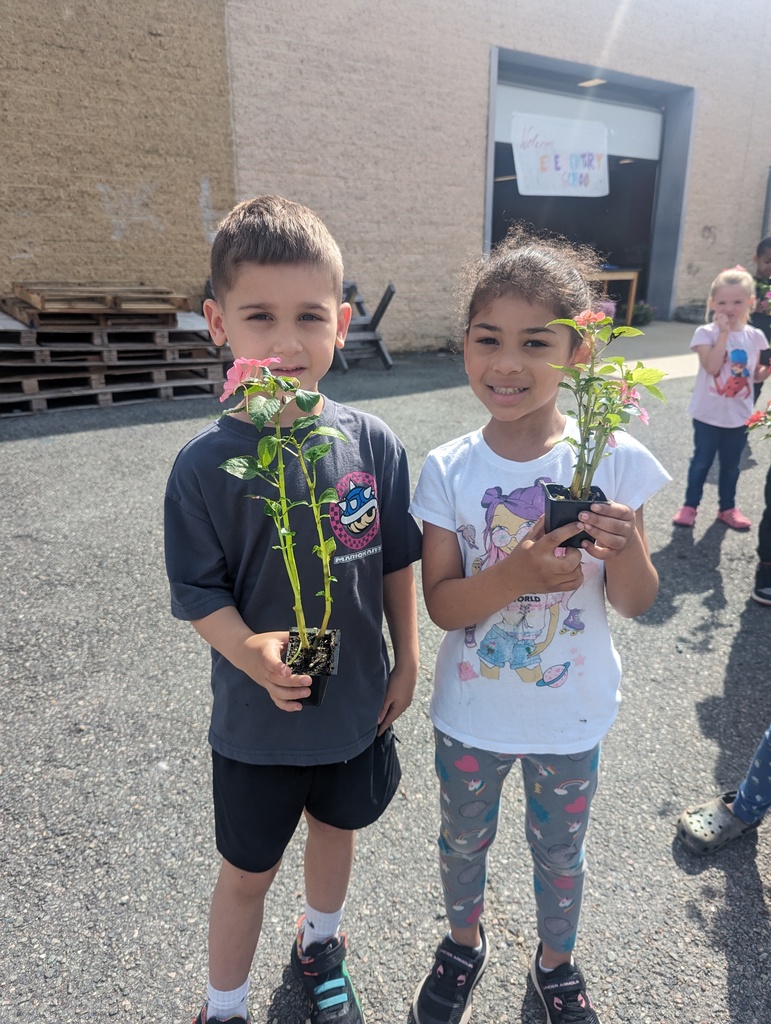 Students buying flowers at CTE