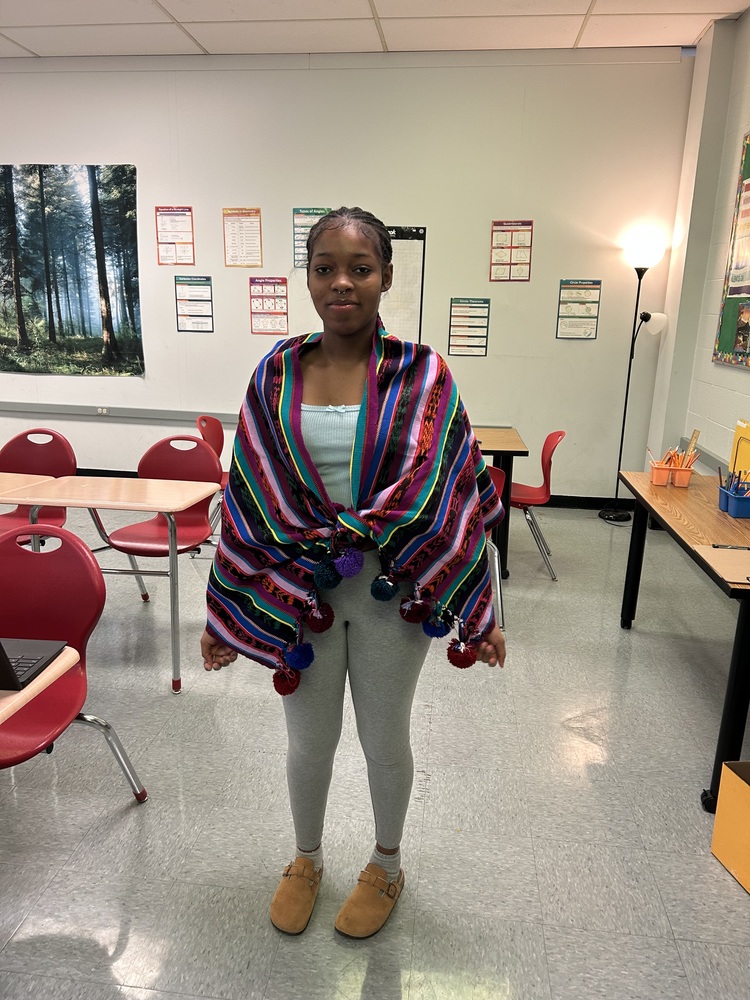 Student wearing a rebozo