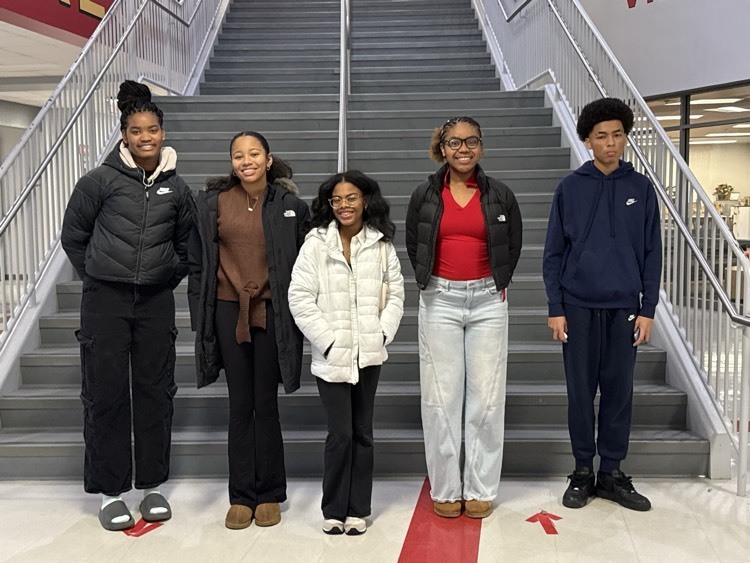 leadership summit students standing by the PHS staircase 
