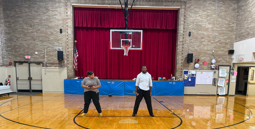 Tim Walker, principal of Glendale Elementary School practices his dancing skills after school.