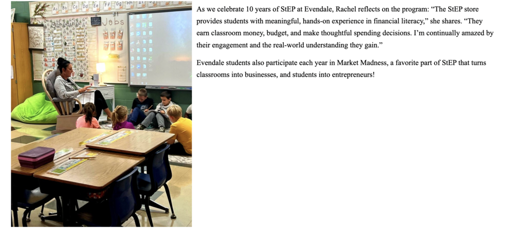 StEP at Evendale with teacher reading a book and students on rug in front of a smart board.