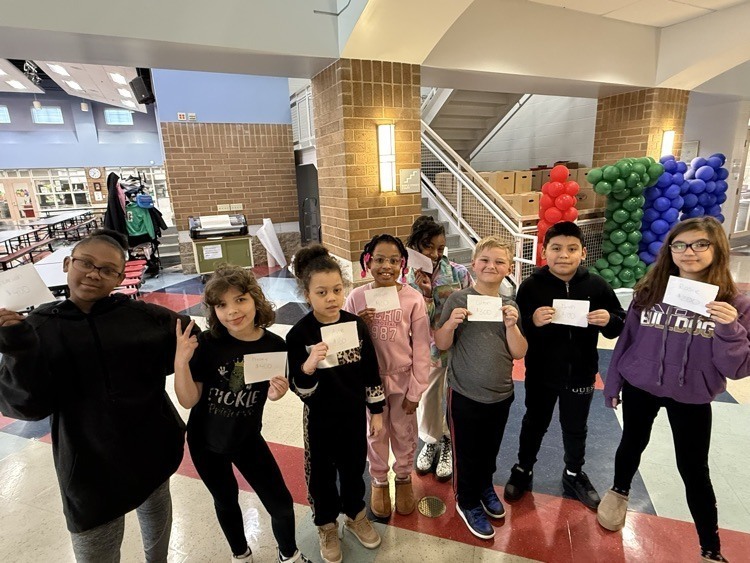 Group of Sharonville Elementary students who are part of the Student Lighthouse Team being recognized with certificates for their contribution to the Leader in Me school tours.
