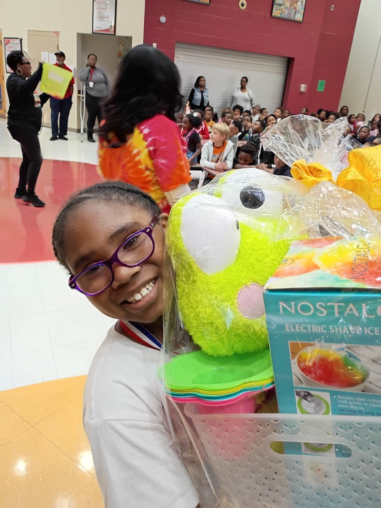 Woodlawn Walkathon Winner - student holding prize basket