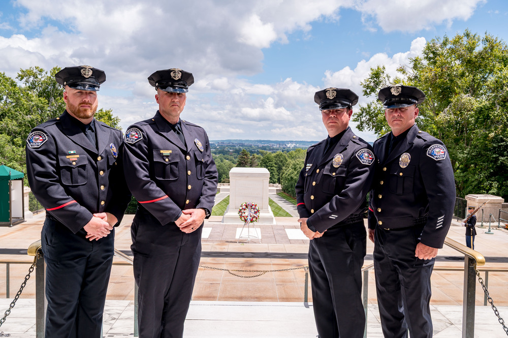 Four Sharonville Police Officers, including 2 Princeton SROs had stand in full uniform in front of the tomb of the unknown solider after laying a wreath to honor the fallen.