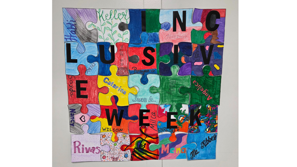 poster made wtih students creating puzzle pieces with their names and on it that they decorated