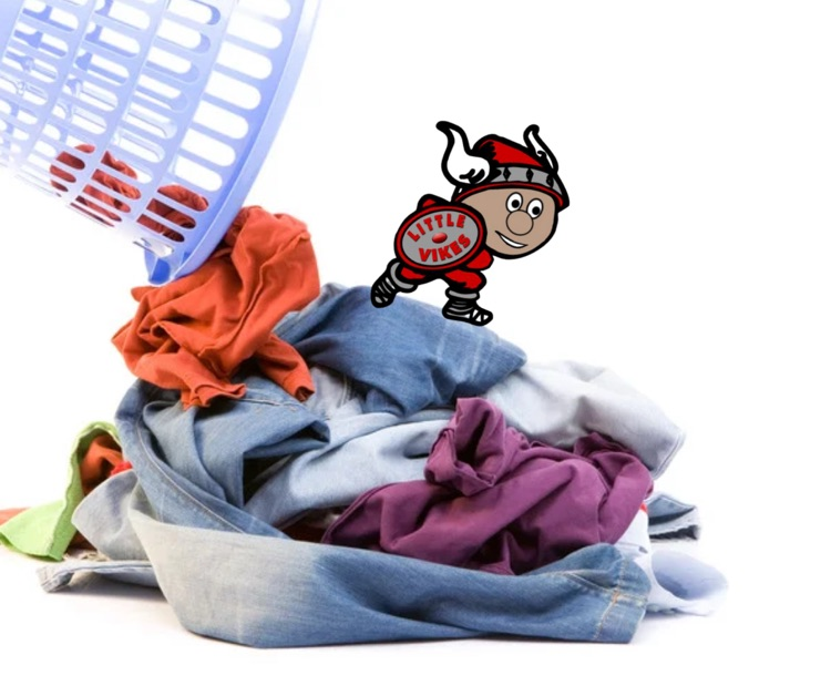 Little Vike character on top of laundry falling out of a basket into a pile