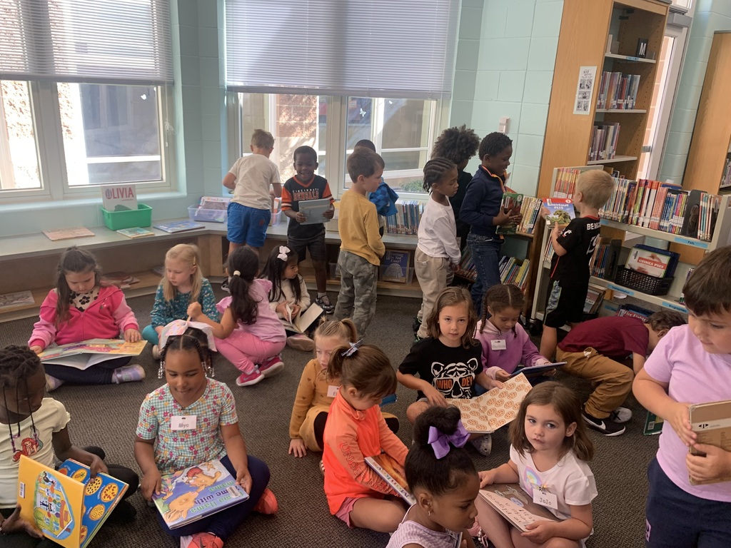kinder visits library
