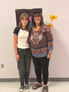 Photo of IB Learner Student of the month posed with her teacher