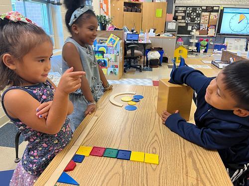 Pre K friends using their senses to explore and learn.