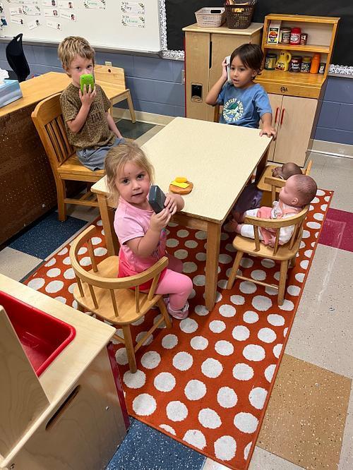 Pre K friends in the dramatic play area