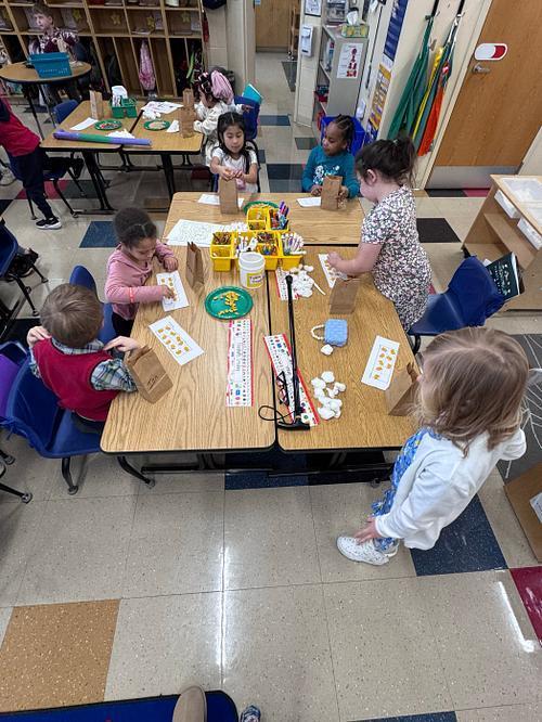 students making a 100 day snack mix