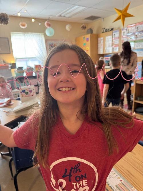 #EV student in red shirt with spring