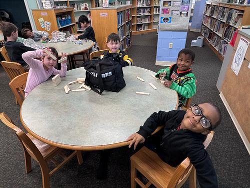 #EV students exploring with wooden blocks at library