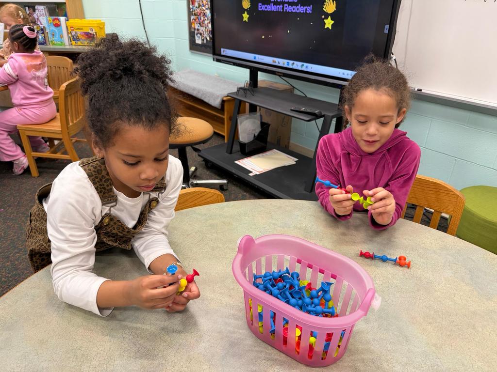 #EV students exploring with objects at library