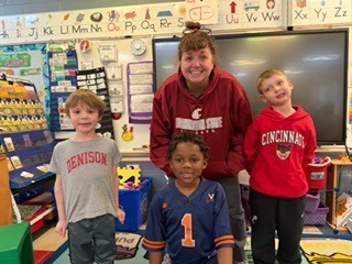 #EV staff and students in college gear 