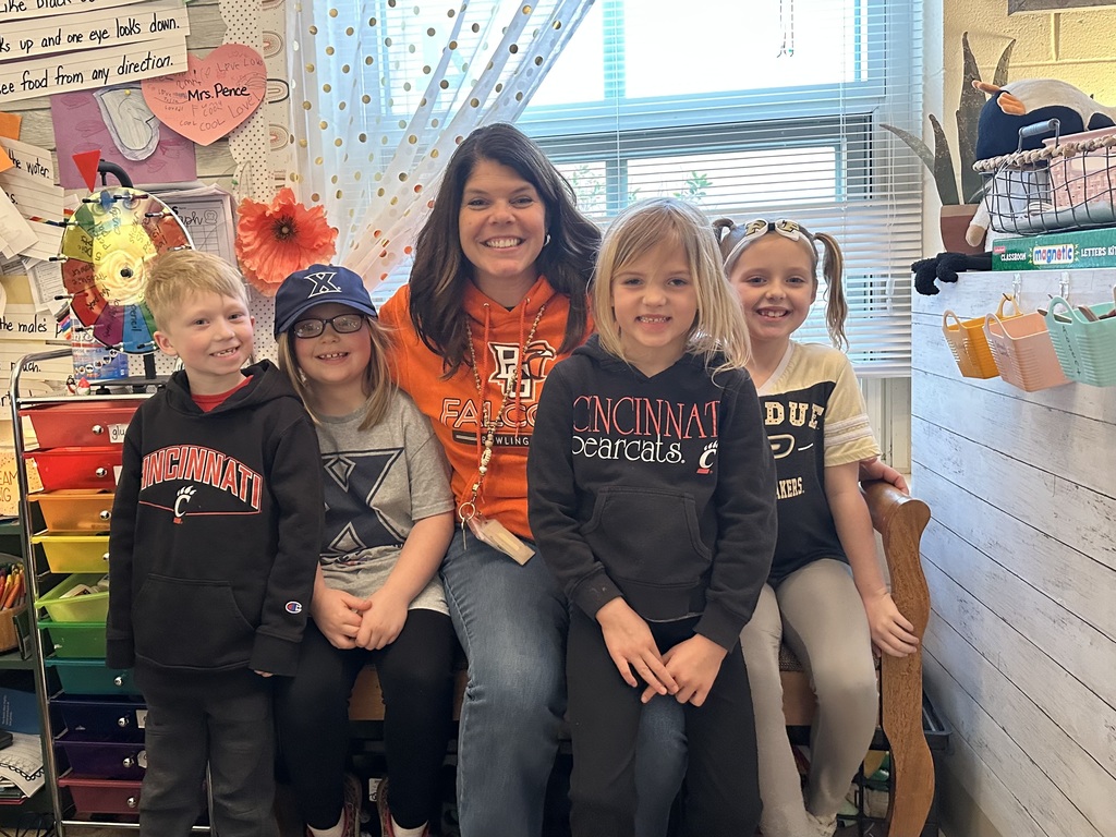 #EV staff and students in college gear 