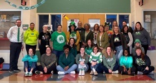 Staff members dressed in green #EV 