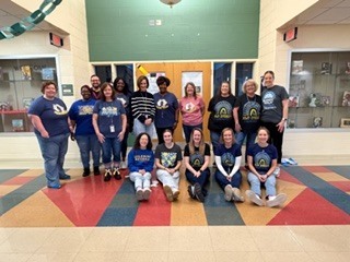 #EV staff dressed in blue and yellow outfits