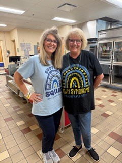 #EV staff dressed in blue and yellow outfits