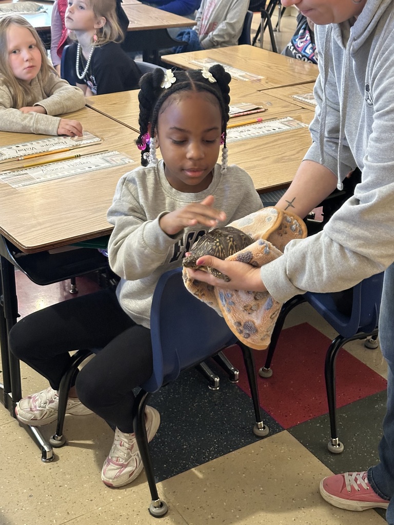 #EV students holding animals in the classroom