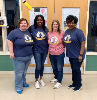 #EV staff dressed in blue and sock shirts