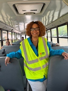 person standing on a bus 