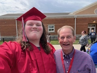 peopole dressed in graduation caps and gowns
