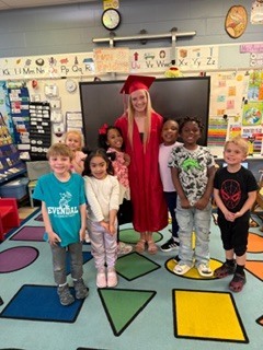 peopole dressed in graduation caps and gowns