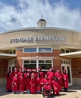 peopole dressed in graduation caps and gowns