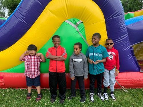 students standing in front of an inflatable structure