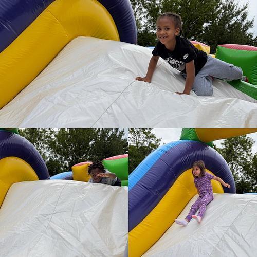 students standing in front of an inflatable structure