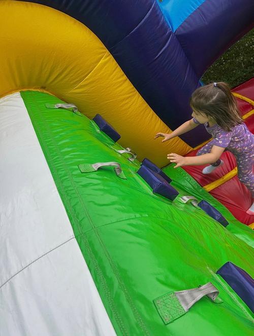 students standing in front of an inflatable structure