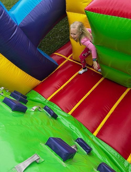 students standing in front of an inflatable structure