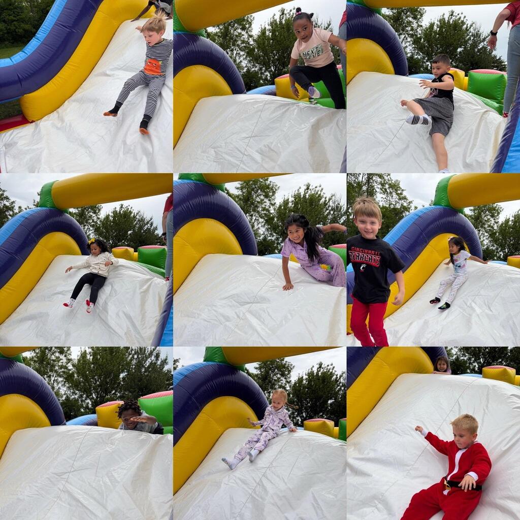 students standing in front of an inflatable structure