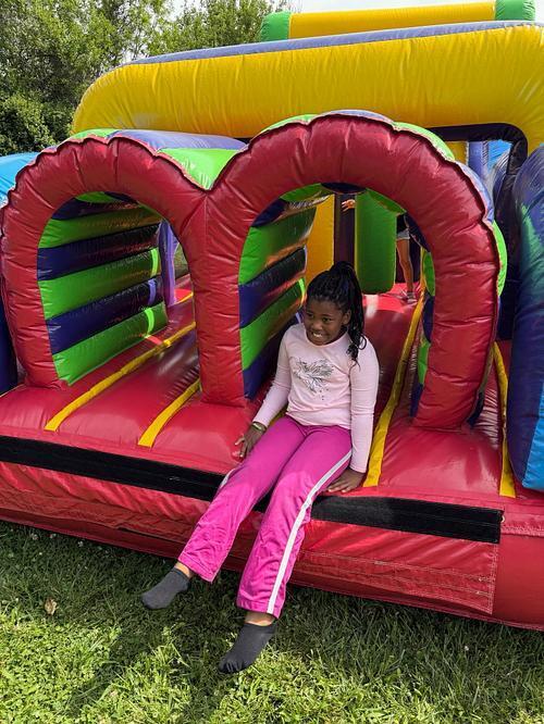 person sitting on a bouncy house