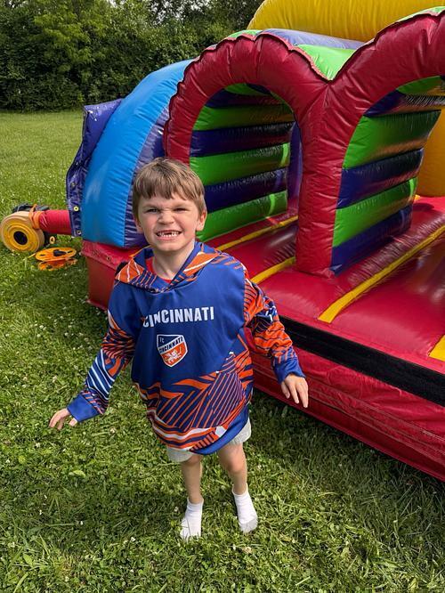 person sitting on a bouncy house