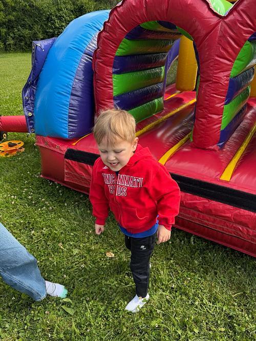 person sitting on a bouncy house