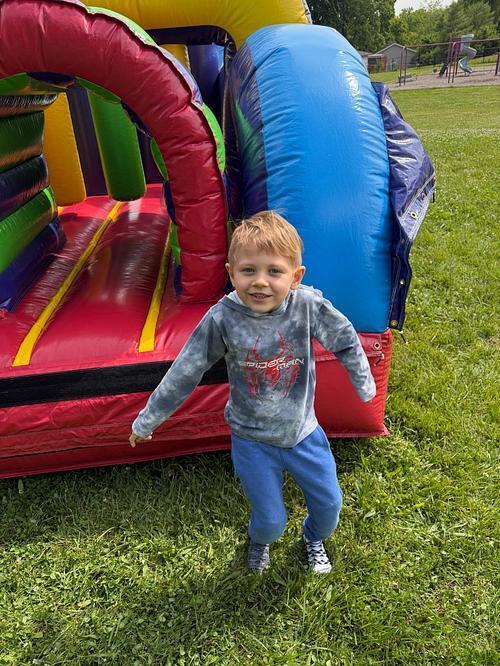 person sitting on a bouncy house