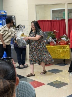 person handing another person a gift