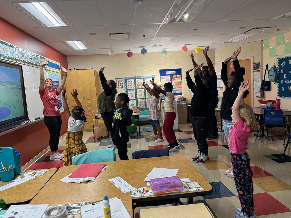 people doing yoga poses