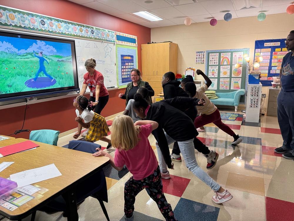people doing yoga poses