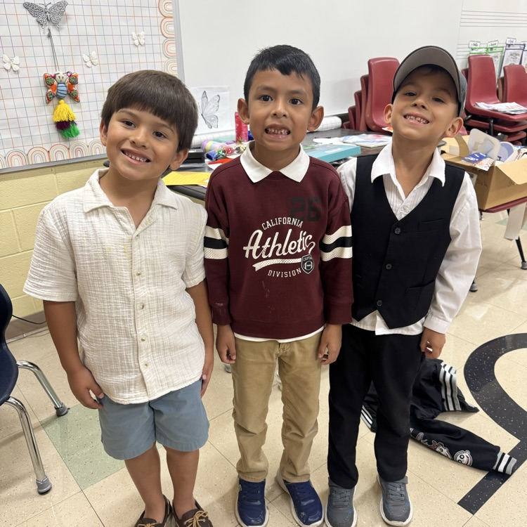 first grade boys smiling and looking sharp on picture day 2026