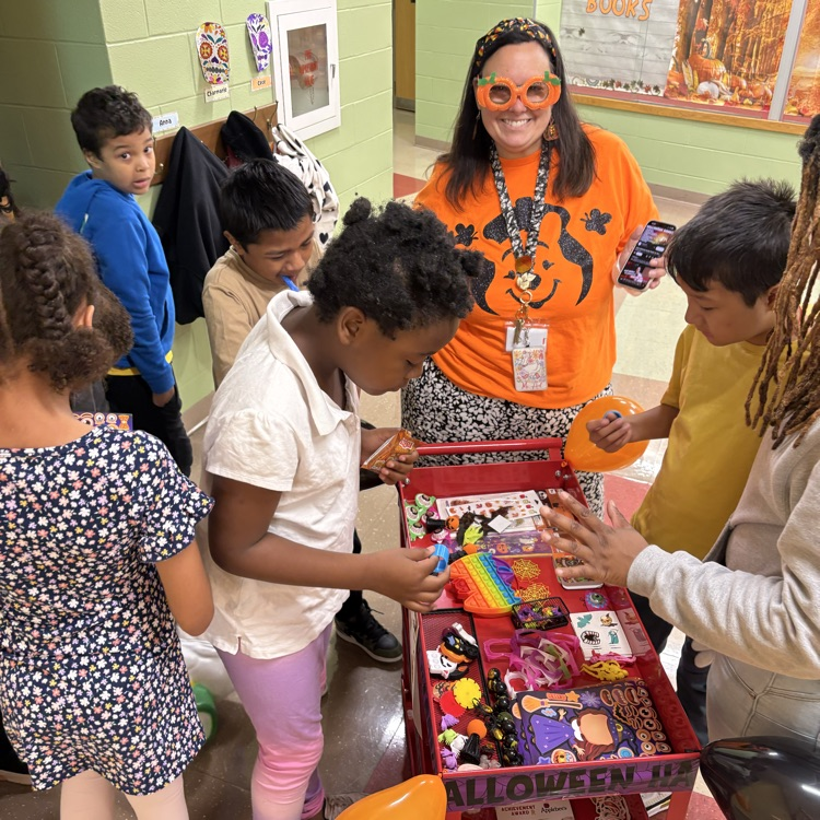 kids shop for a prize from the attendance surprise cart October 2026