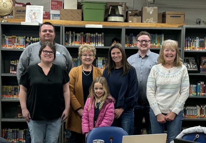 Princeton Elementary school board members pictured with 3rd grader June Gifford