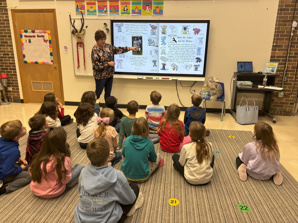 students watch slide show