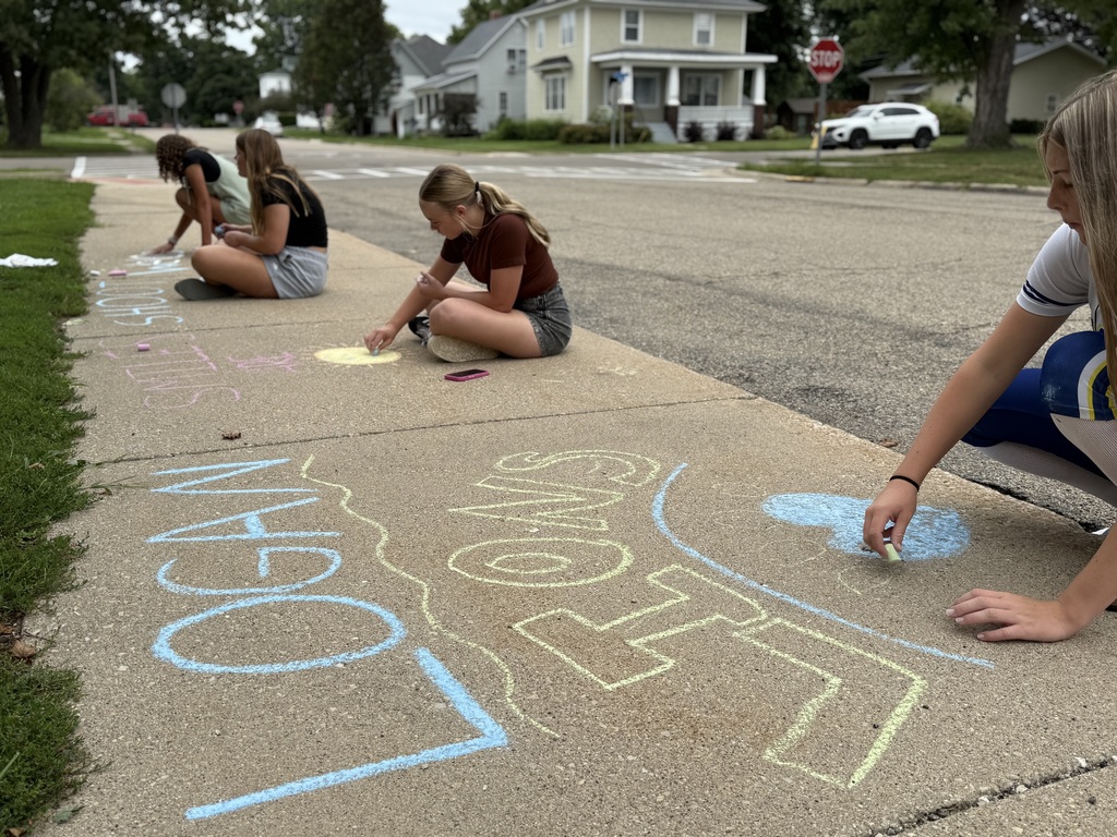 Student Leadership team creating welcome messages for the first day of school.